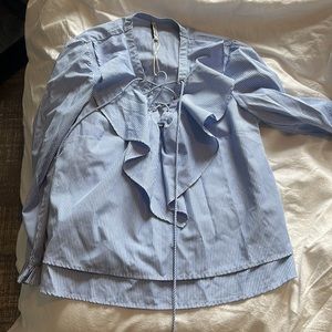 Striped shirt with ruffles